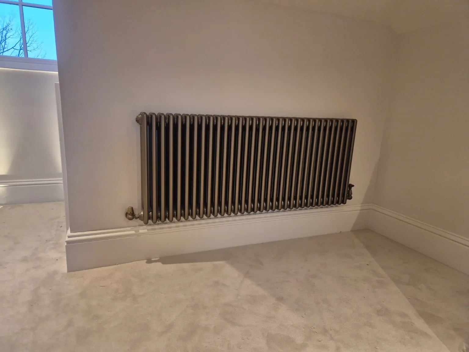 Traditional column radiator by Farrell Plumbing