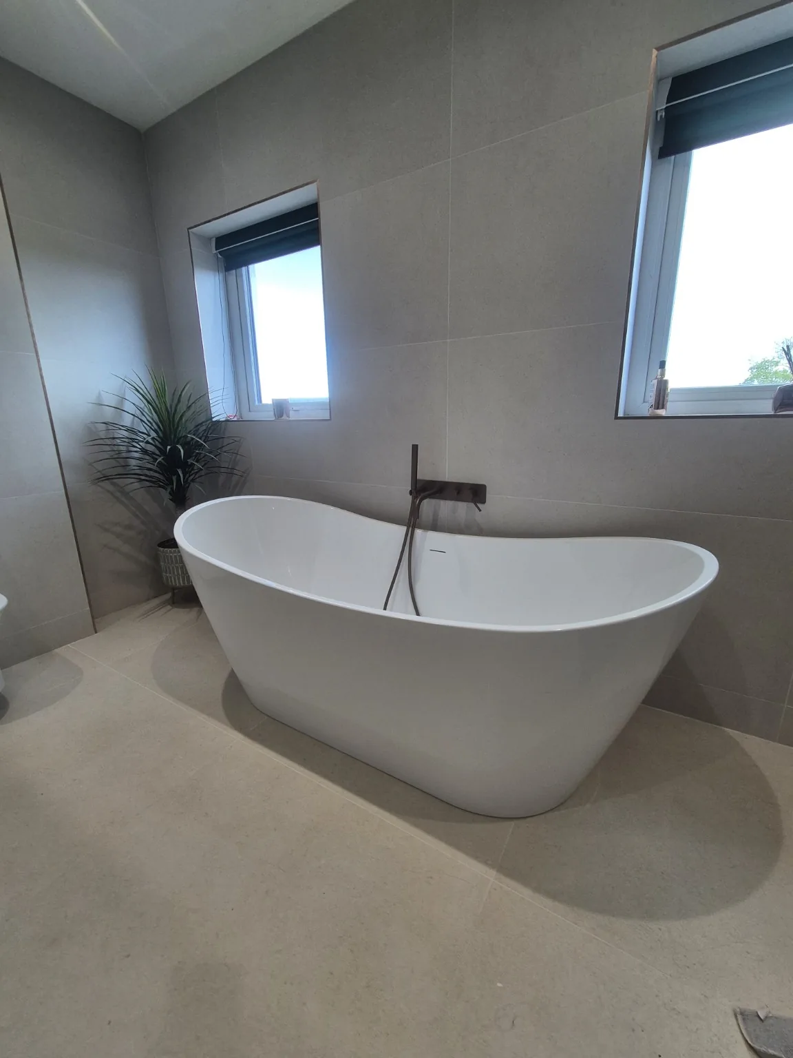 Freestanding bath by Farrell Plumbing