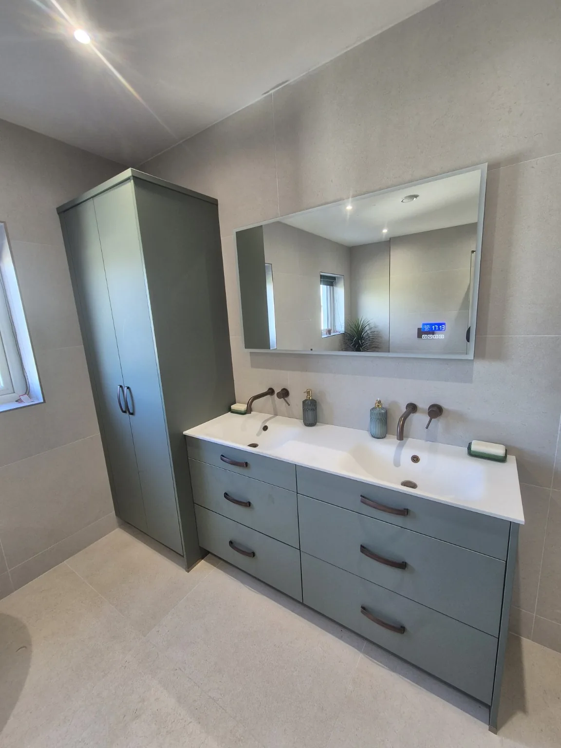 Bathroom vanity finish by Farrell Plumbing