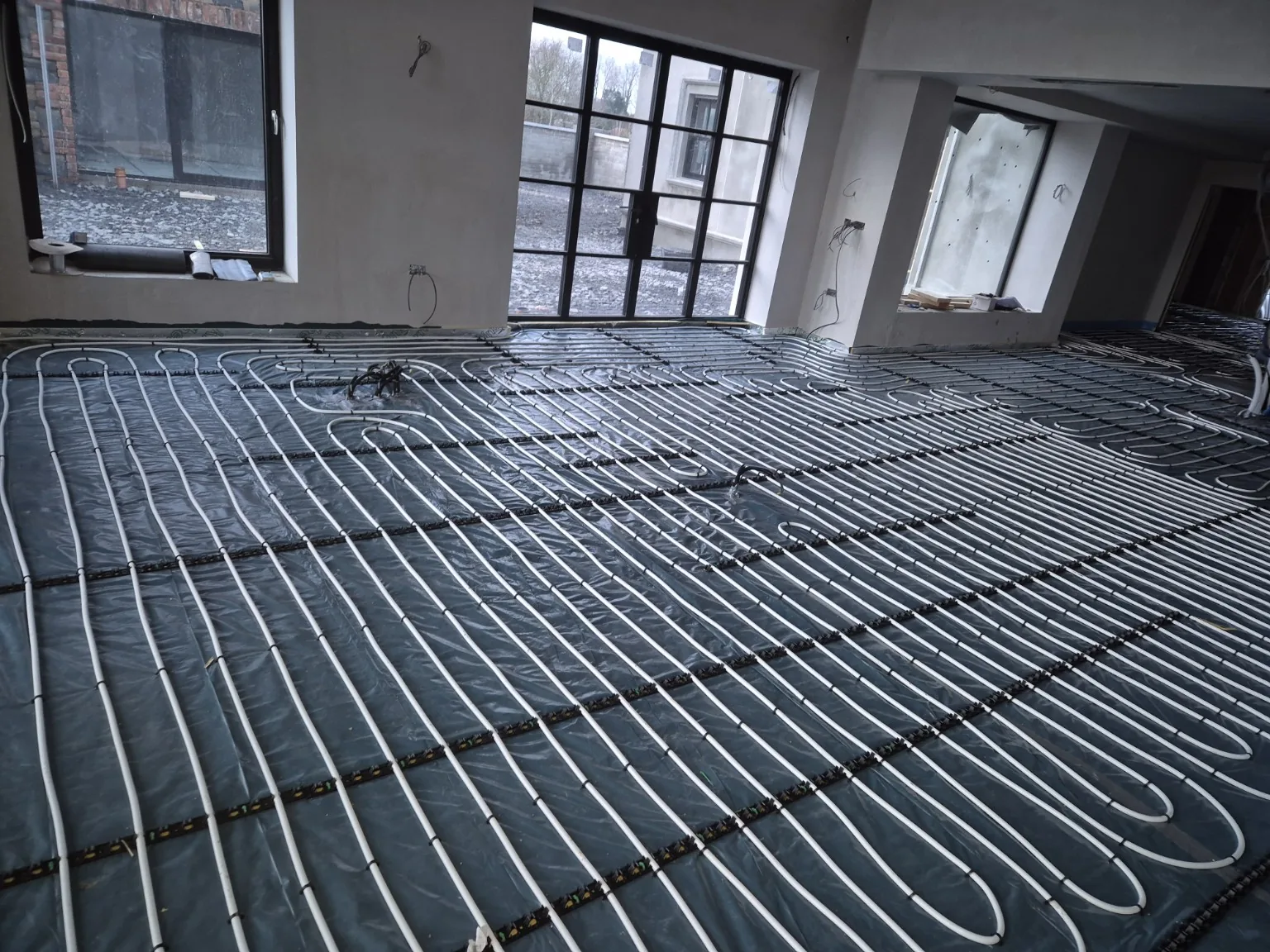 Large-area underfloor heating by Farrell Plumbing