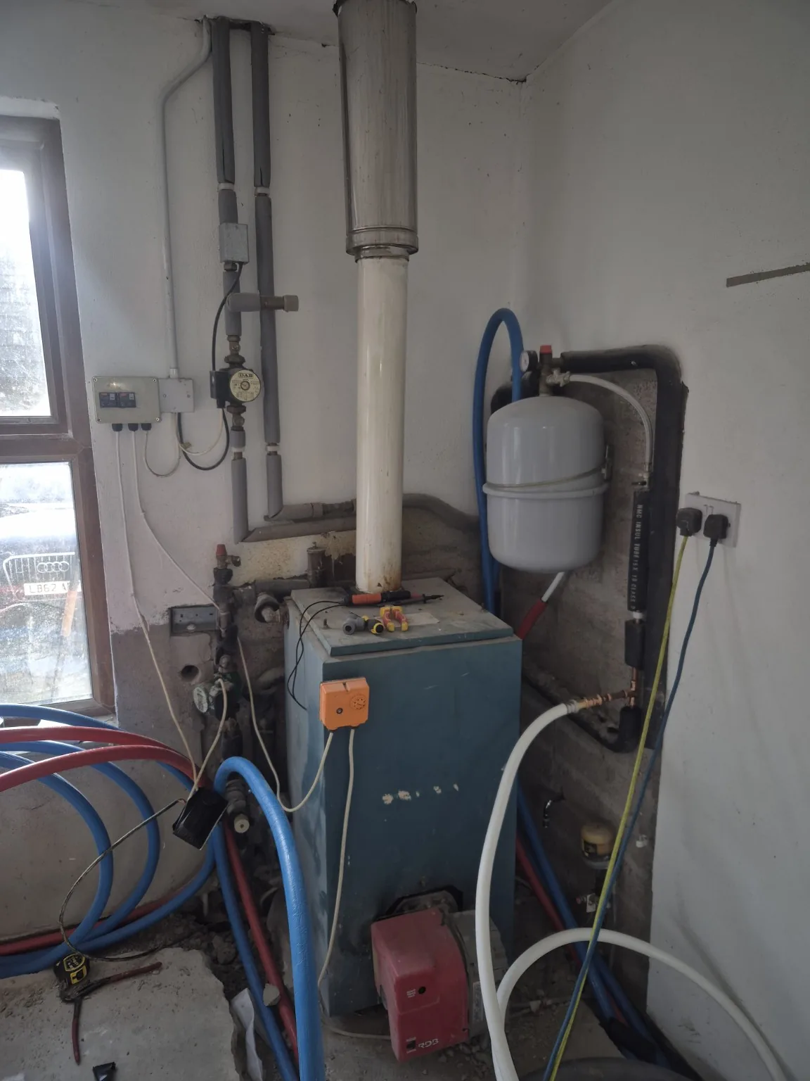 Old oil boiler before upgrade by Farrell Plumbing